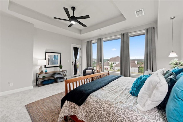 2037 Portobello Rd, Leander, TX 78641 - bedroom with a raised ceiling, carpet flooring, baseboards, access to exterior, and ceiling fan