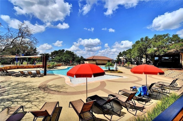 2037 Portobello Rd, Leander, TX 78641 - community pool featuring a patio