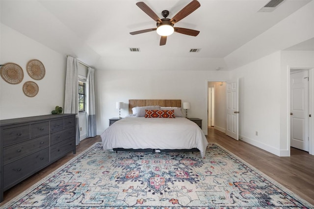 12025 Cherie Dr, Austin, TX 78758 - bedroom with wood finished floors, baseboards, and ceiling fan