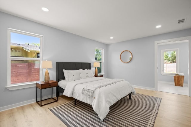4802 Brighton Rd, Austin, TX 78745 - bedroom with wood finished floors and recessed lighting