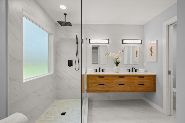 4802 Brighton Rd, Austin, TX 78745 - full bath with marble finish floors, a marble finish shower, and double vanity
