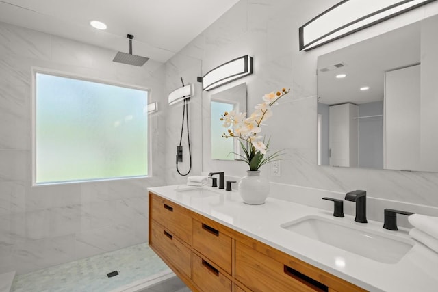 4802 Brighton Rd, Austin, TX 78745 - full bath with double vanity and a marble finish shower