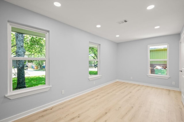 4802 Brighton Rd, Austin, TX 78745 - empty room featuring light wood-style flooring and recessed lighting