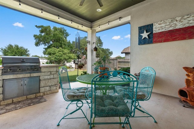 653 Coyote Creek Way, Kyle, TX 78640 - view of patio / terrace with ceiling fan and outdoor dining area