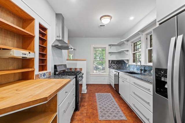 3406 Duval St, Austin, TX 78705 - kitchen featuring open shelves, stainless steel appliances, wall chimney range hood, and wood counters