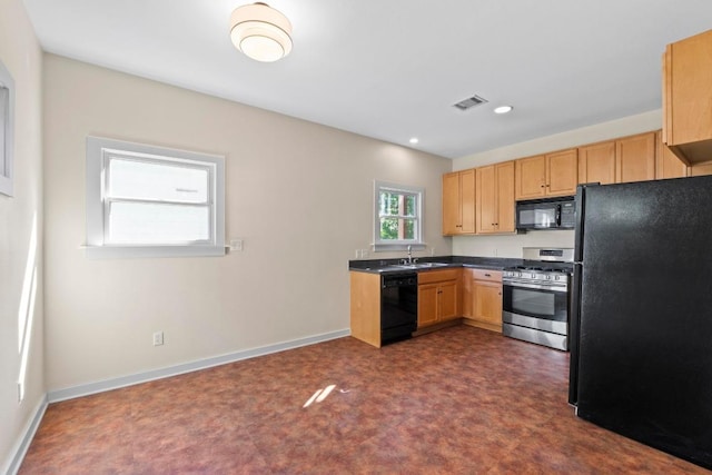 3406 Duval St, Austin, TX 78705 - kitchen with black appliances, a sink, dark countertops, baseboards, and light brown cabinetry