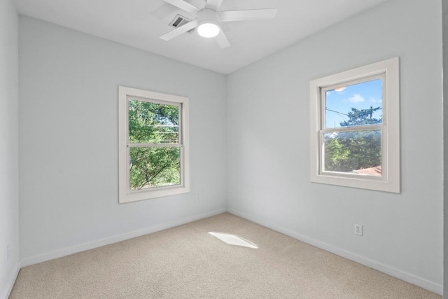 3406 Duval St, Austin, TX 78705 - carpeted spare room with baseboards and ceiling fan