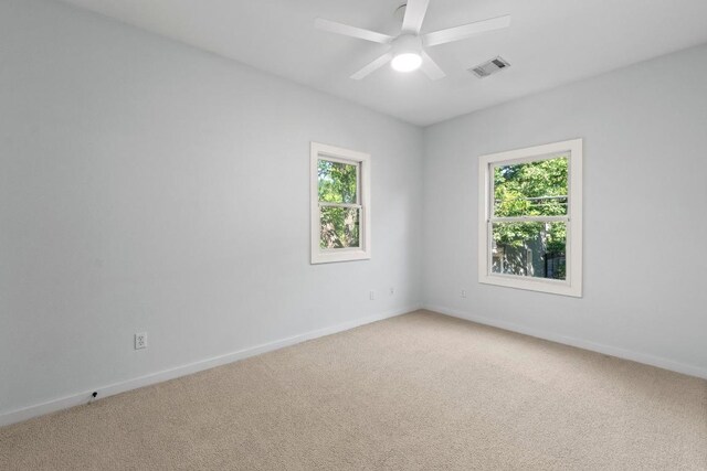 3406 Duval St, Austin, TX 78705 - spare room with light carpet, plenty of natural light, and a ceiling fan