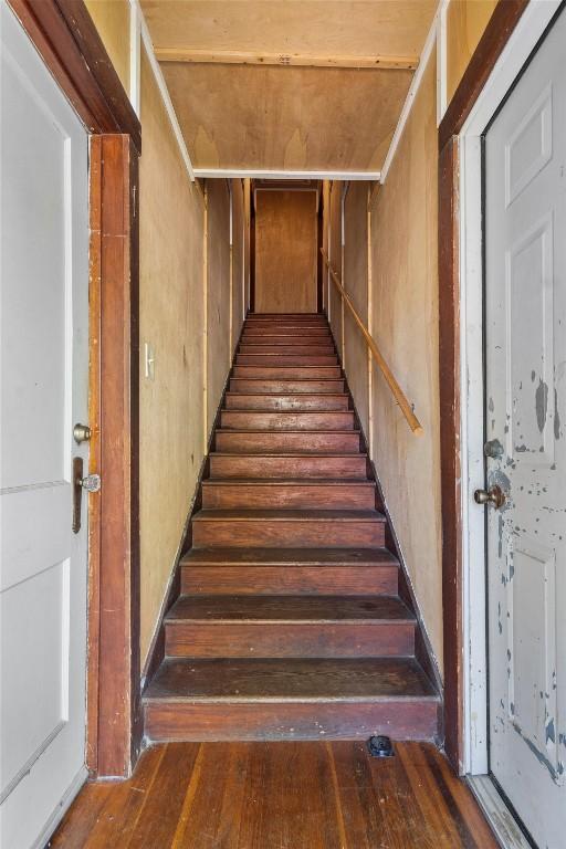 604 Harris Ave, Austin, TX 78705 - stairs with hardwood / wood-style floors