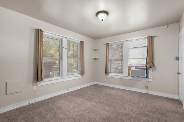 604 Harris Ave, Austin, TX 78705 - unfurnished room with carpet floors, baseboards, cooling unit, and a smoke detector