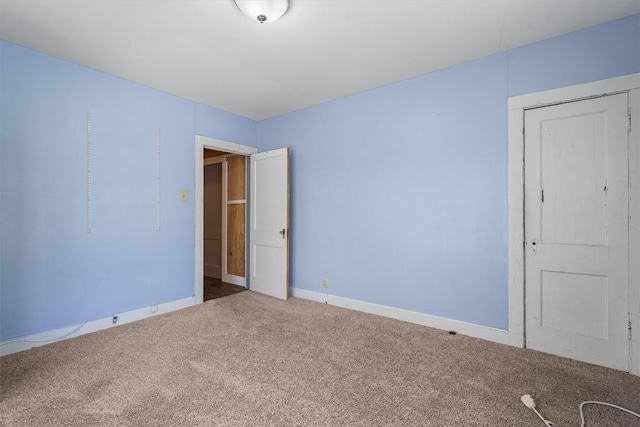 604 Harris Ave, Austin, TX 78705 - unfurnished bedroom with carpet floors and baseboards