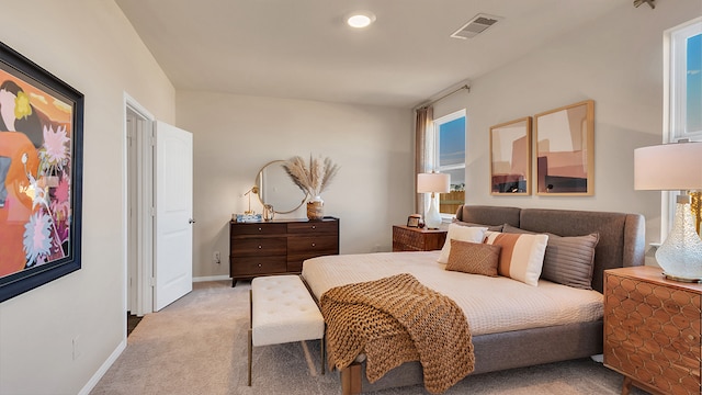 166 Caddo Bnd, Kyle, TX 78640 - bedroom featuring light carpet and baseboards