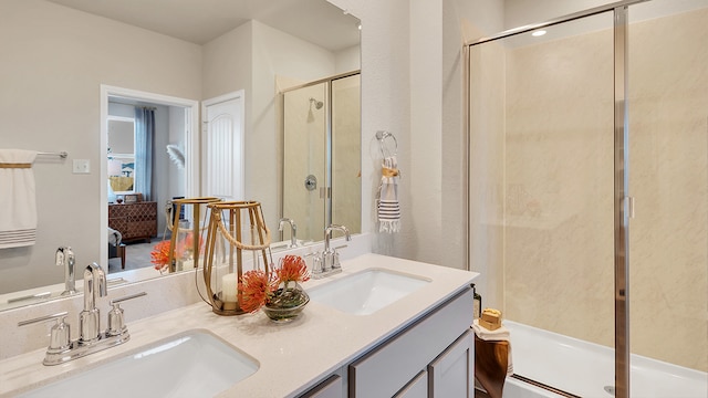 166 Caddo Bnd, Kyle, TX 78640 - ensuite bathroom with a stall shower and double vanity