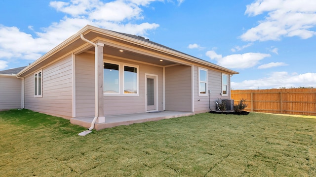 166 Caddo Bnd, Kyle, TX 78640 - rear view of house with a patio and cooling unit