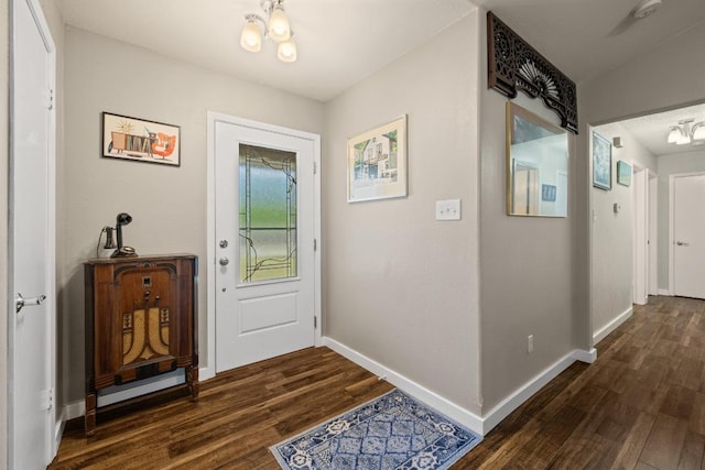 3704 Del Rio Ct, Georgetown, TX 78628 - foyer featuring a chandelier and dark wood-style flooring