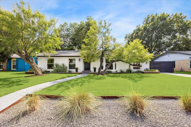 5808 Marilyn Dr, Austin, TX 78757 - view of front of house with a front lawn