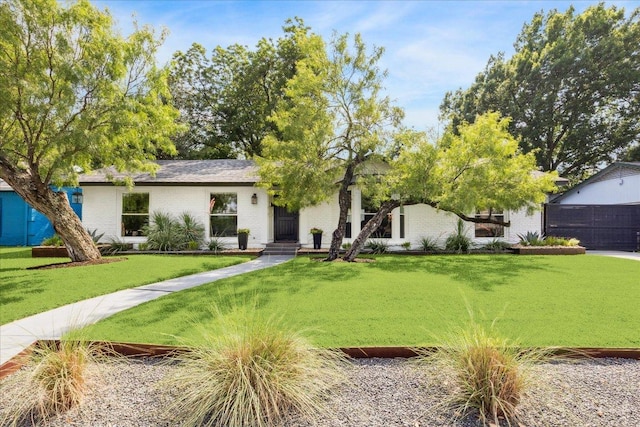 5808 Marilyn Dr, Austin, TX 78757 - view of front of property featuring a front lawn and brick siding