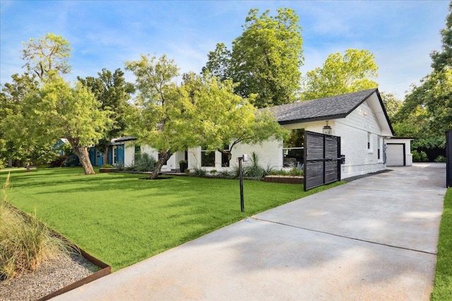 5808 Marilyn Dr, Austin, TX 78757 - view of front of property with a front yard, an outdoor structure, and a garage