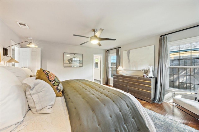 5808 Marilyn Dr, Austin, TX 78757 - bedroom with wood finished floors and ceiling fan