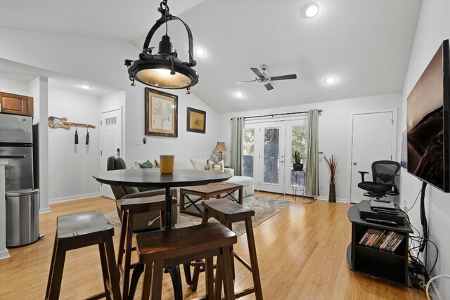 3601 Menchaca Rd Unit 215, Austin, TX 78704 - dining space featuring vaulted ceiling, ceiling fan, light wood-style flooring, french doors, and recessed lighting