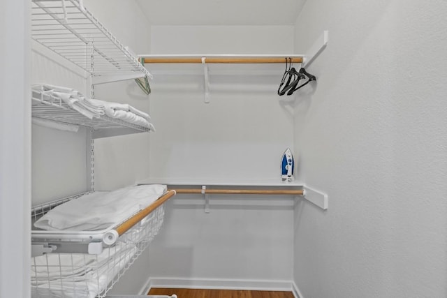 3601 Menchaca Rd Unit 215, Austin, TX 78704 - walk in closet with wood finished floors