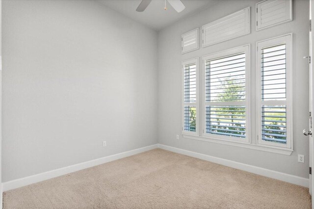 8103 Chrysler Bnd, Austin, TX 78744 - carpeted empty room featuring ceiling fan, baseboards, and healthy amount of natural light