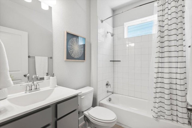 8103 Chrysler Bnd, Austin, TX 78744 - full bath featuring toilet, shower / bath combo, vanity, and a textured wall
