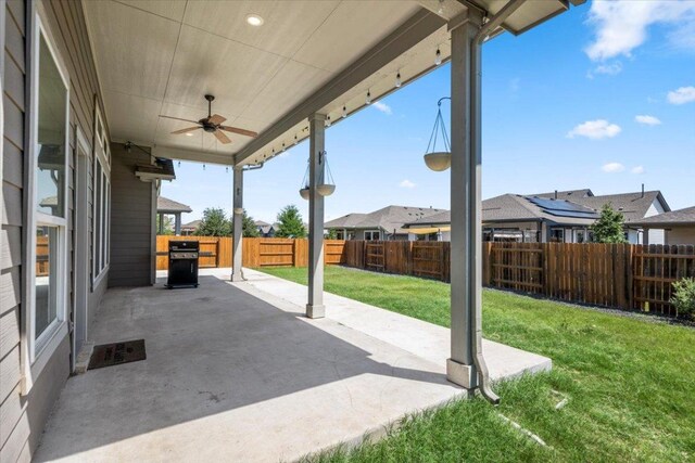 8103 Chrysler Bnd, Austin, TX 78744 - view of patio / terrace featuring a ceiling fan and a residential view