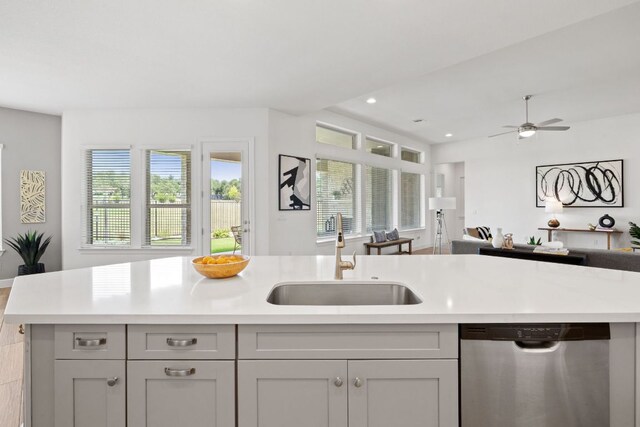 269 Call Dr, Austin, TX 78737 - kitchen with dishwasher, open floor plan, light countertops, recessed lighting, and ceiling fan