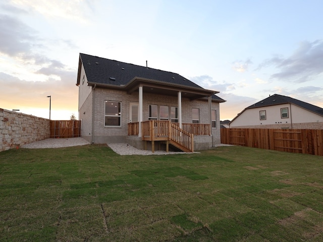 1200 Snowdrop Ln, Georgetown, TX 78628 - rear view of property featuring brick siding, a patio, a wooden deck, and a shingled roof