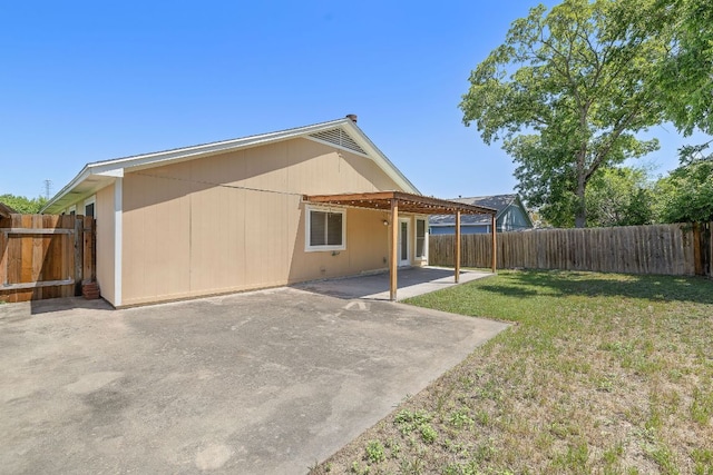 11611 Prairie Hen Ln, Austin, TX 78758 - rear view of property with a patio