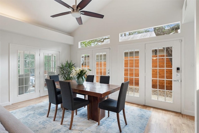 2103 W 10th St, Austin, TX 78703 - dining room featuring french doors, light wood-type flooring, high vaulted ceiling, and ceiling fan