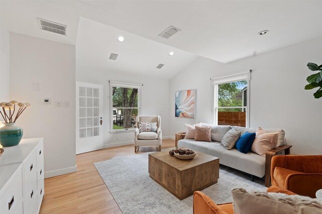 2103 W 10th St, Austin, TX 78703 - living area featuring light wood finished floors, vaulted ceiling, baseboards, and recessed lighting