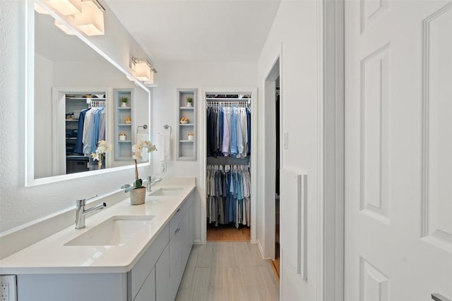 2103 W 10th St, Austin, TX 78703 - bathroom with double vanity and a walk in closet