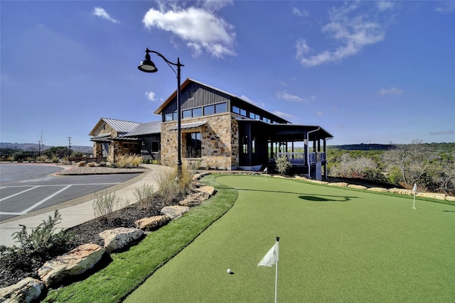 6408 Empresa Dr, Austin, TX 78738 - view of community with a putting area