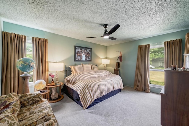3304 Whitepine Dr, Austin, TX 78757 - carpeted bedroom featuring ceiling fan and a textured ceiling