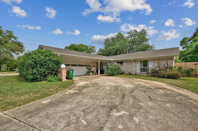 3304 Whitepine Dr, Austin, TX 78757 - ranch-style home with a garage, driveway, and brick siding