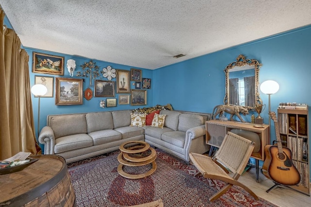 3304 Whitepine Dr, Austin, TX 78757 - living area featuring a textured ceiling