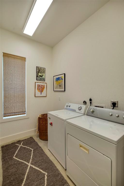 281 Kendall Jackson, Comfort, TX 78013 - laundry area with washing machine and dryer and baseboards