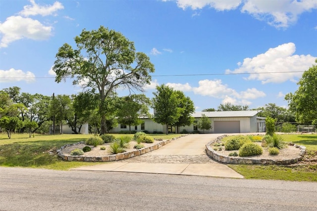 281 Kendall Jackson, Comfort, TX 78013 - view of front of home with driveway, a front lawn, and an attached garage