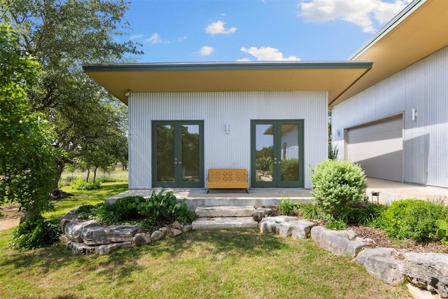 281 Kendall Jackson, Comfort, TX 78013 - property entrance featuring french doors, a garage, and a lawn