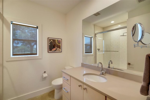 281 Kendall Jackson, Comfort, TX 78013 - bathroom with toilet, baseboards, tiled shower, vanity, and recessed lighting