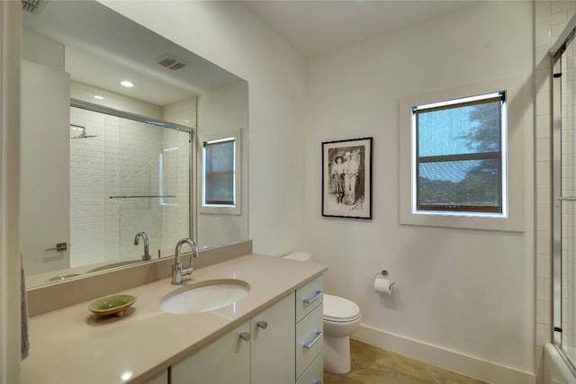 281 Kendall Jackson, Comfort, TX 78013 - full bath featuring toilet, vanity, baseboards, combined bath / shower with glass door, and tile patterned floors