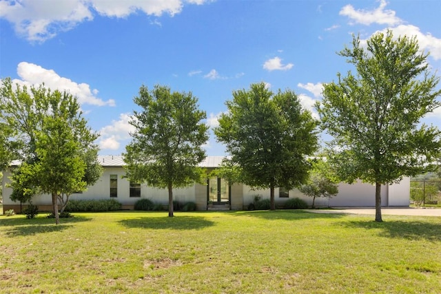 281 Kendall Jackson, Comfort, TX 78013 - view of front of property featuring a front yard, a garage, concrete driveway, and metal roof