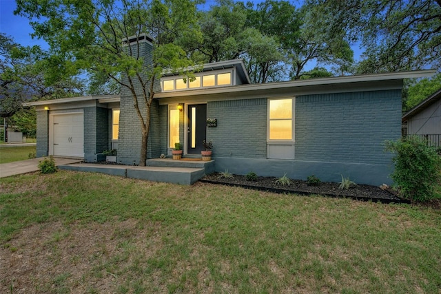 1804 Matthews Ln Unit B, Austin, TX 78745 - mid-century home with a front lawn, brick siding, and driveway