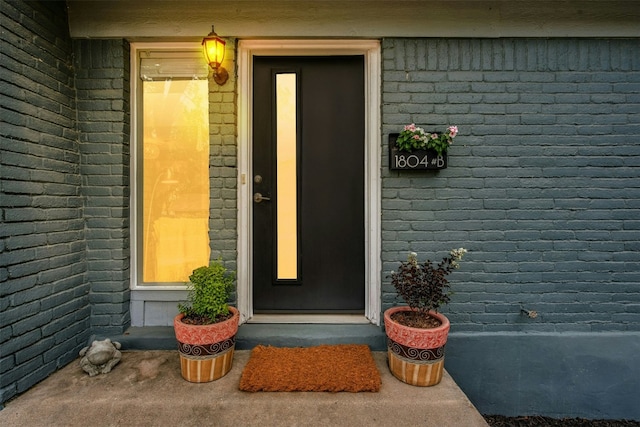1804 Matthews Ln Unit B, Austin, TX 78745 - view of exterior entry featuring brick siding