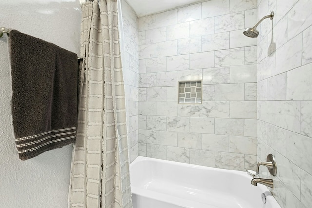 1804 Matthews Ln Unit B, Austin, TX 78745 - full bath with shower / bath combo and a textured wall