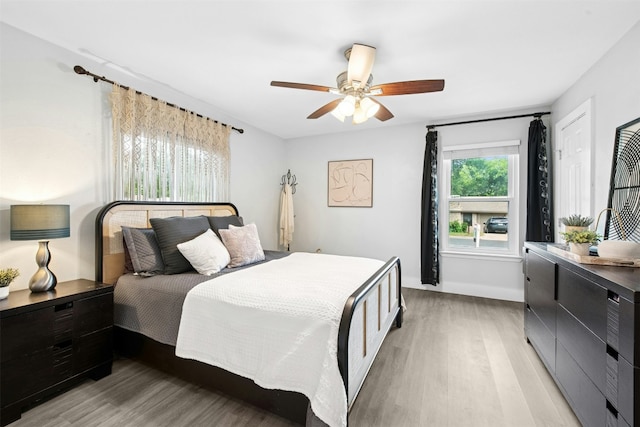 1804 Matthews Ln Unit B, Austin, TX 78745 - bedroom featuring light wood-type flooring and ceiling fan