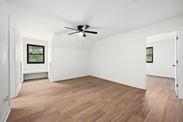 322 Mesa Oaks, Leander, TX 78641 - bonus room with a ceiling fan, healthy amount of natural light, wood finished floors, vaulted ceiling, and baseboards