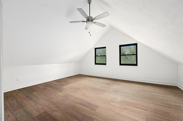 322 Mesa Oaks, Leander, TX 78641 - additional living space with vaulted ceiling, wood finished floors, baseboards, and a ceiling fan